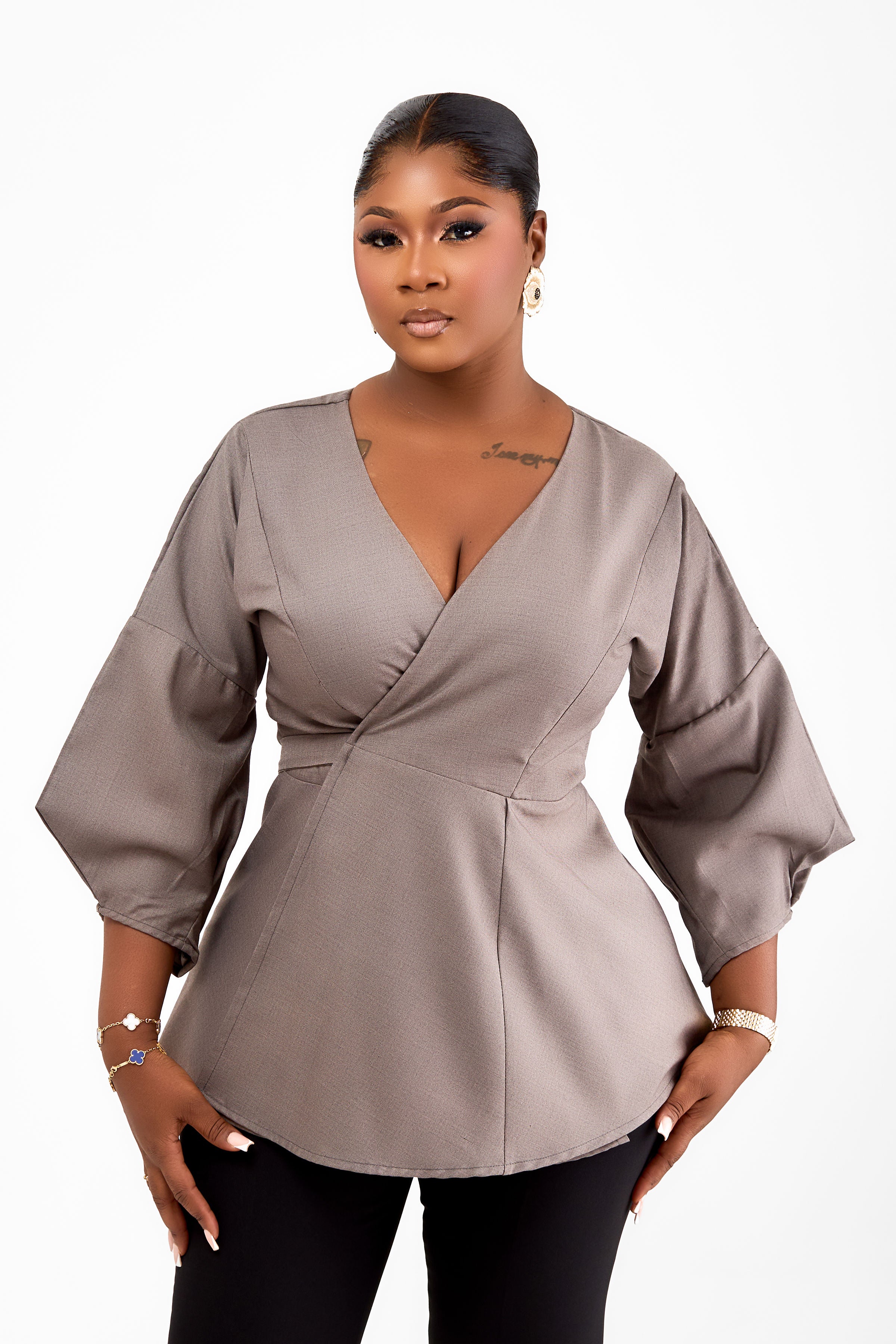 THE STATEMENT BLOUSE